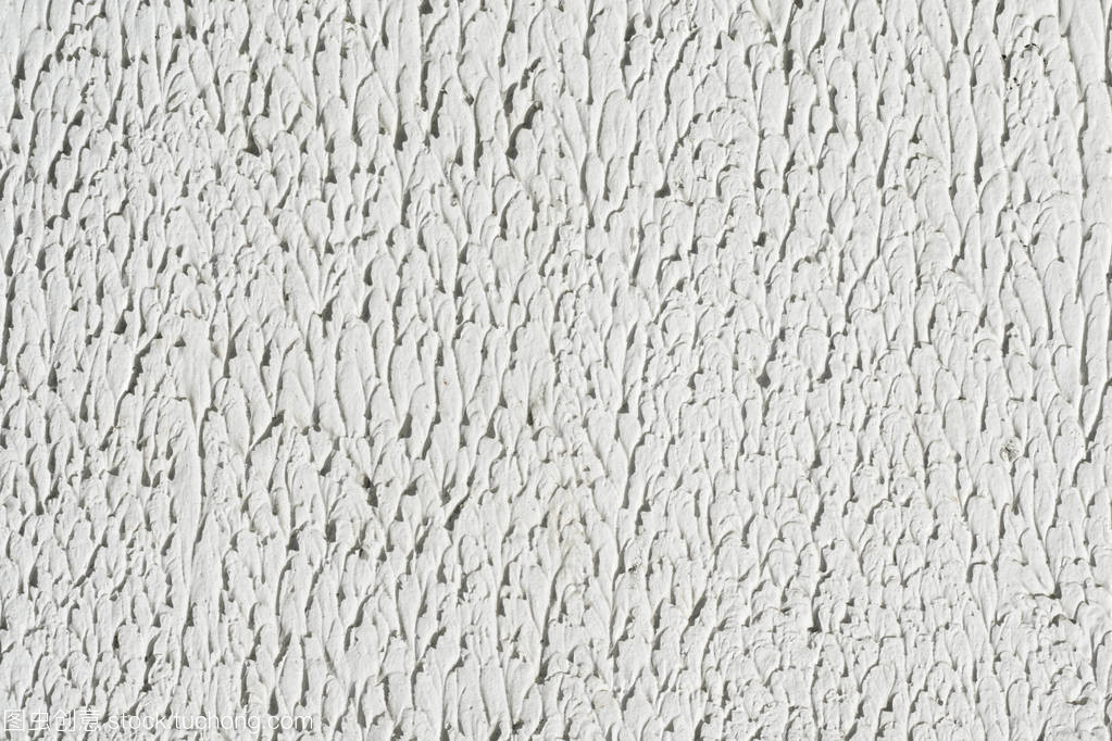 白色的石膏墙纹理。空的明亮石膏背景